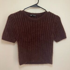 This is a fluffy brown cropped top from ZARA. It’s super cute and it’s a Medium.